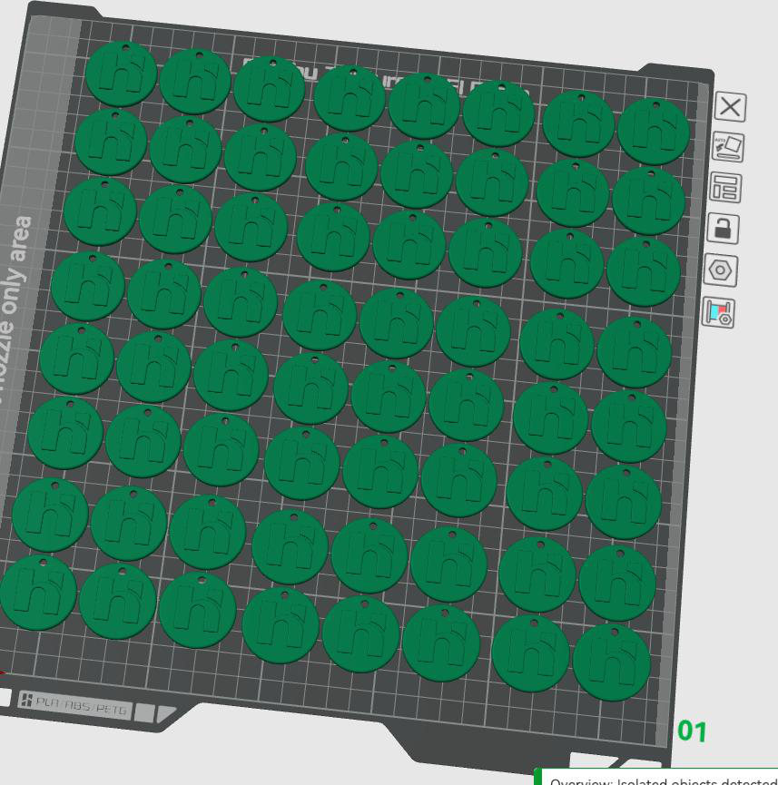 Slicer view of a full printer build plate covered in green round keychains
