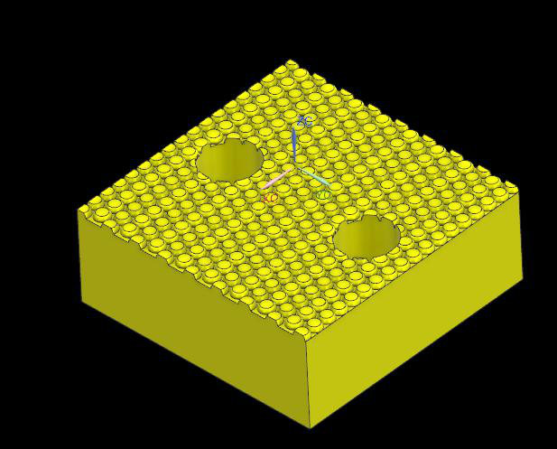 CAD model of a yellow gripper pad covered in small round studs